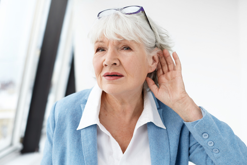 Pulsatile Tinnitus woman with ringing in her ears